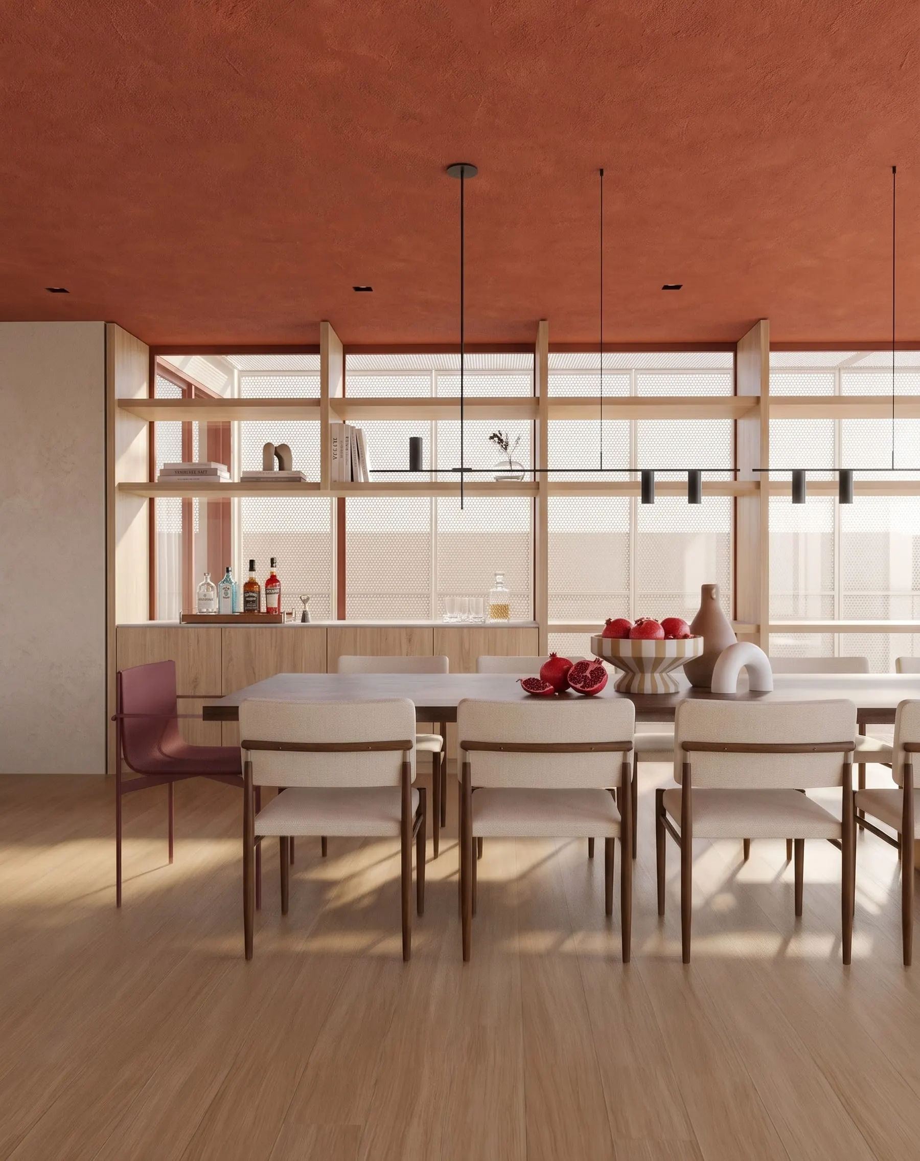 Sala de jantar com mesa ampla e estante em madeira clara