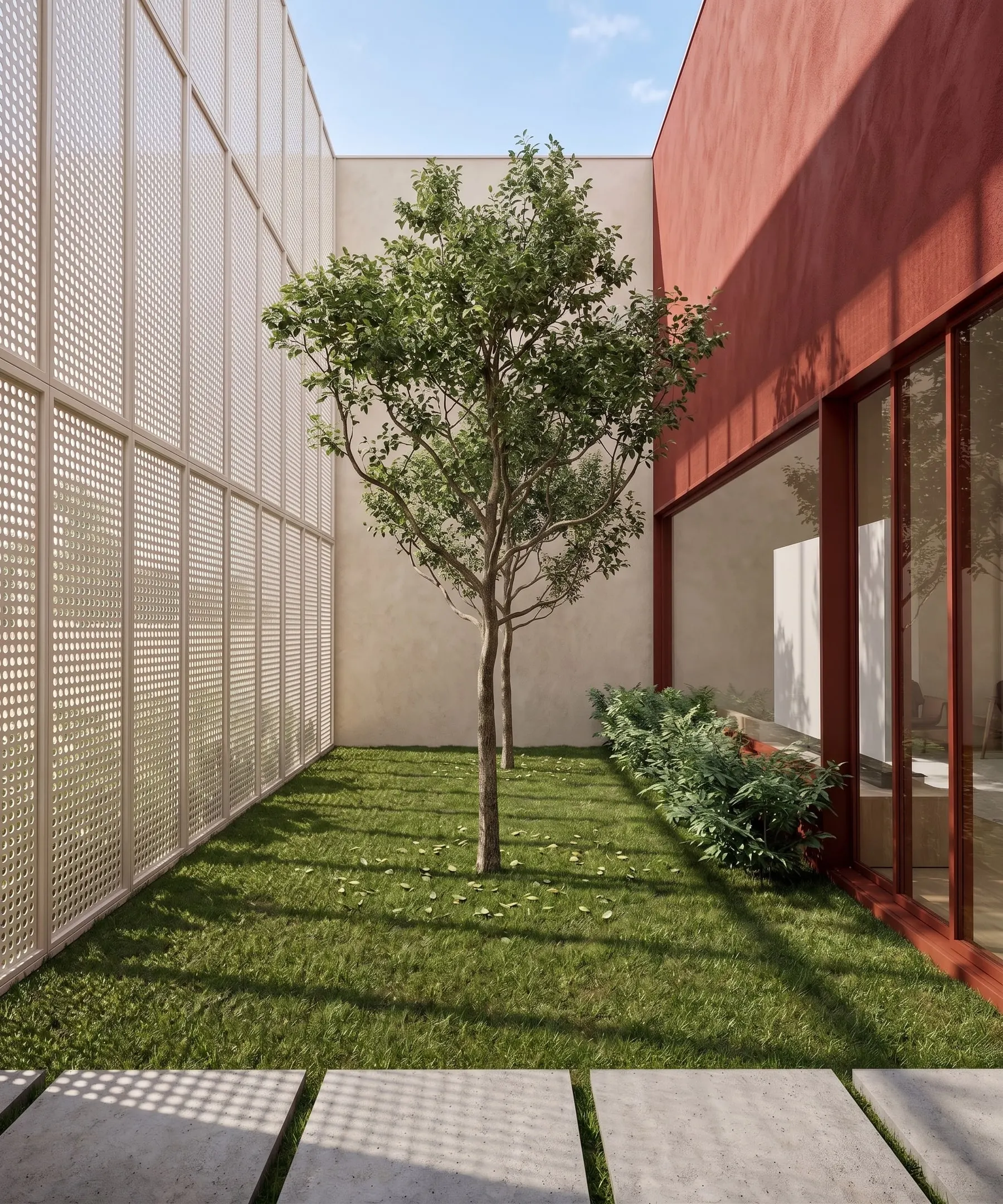 Jardim entre a tela da fachada e a sala, com uma árvore no centro